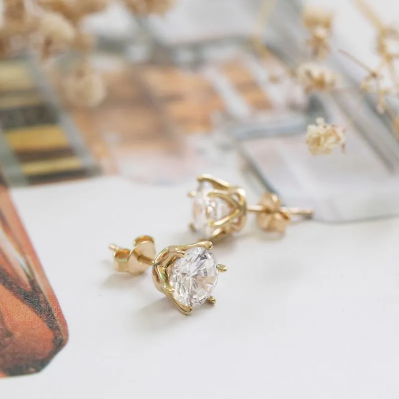 14 Carat Gold Earrings In a 7mm White Zircon Inlay