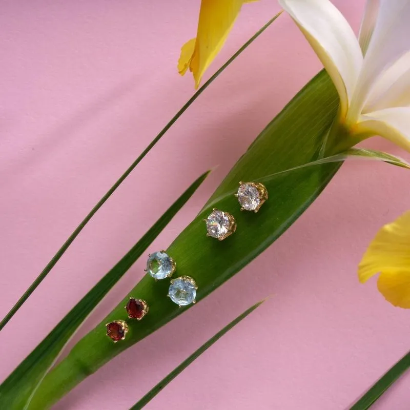 14 Carat Gold Earrings In a 7mm White Zircon Inlay