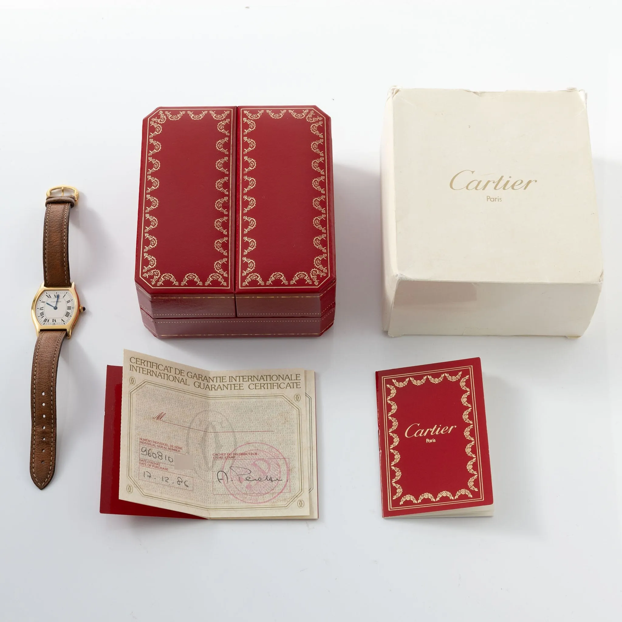 Ultra-Thin Cartier Tortue Watch in 18kt Yellow Gold with Box and Papers