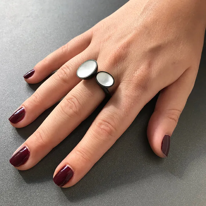 Sure, I can help with that. Heres an optimized title with modifiers for your e-commerce product:

Stylish Double Semi Hemisphere Statement Ring - Unique Geometric Design