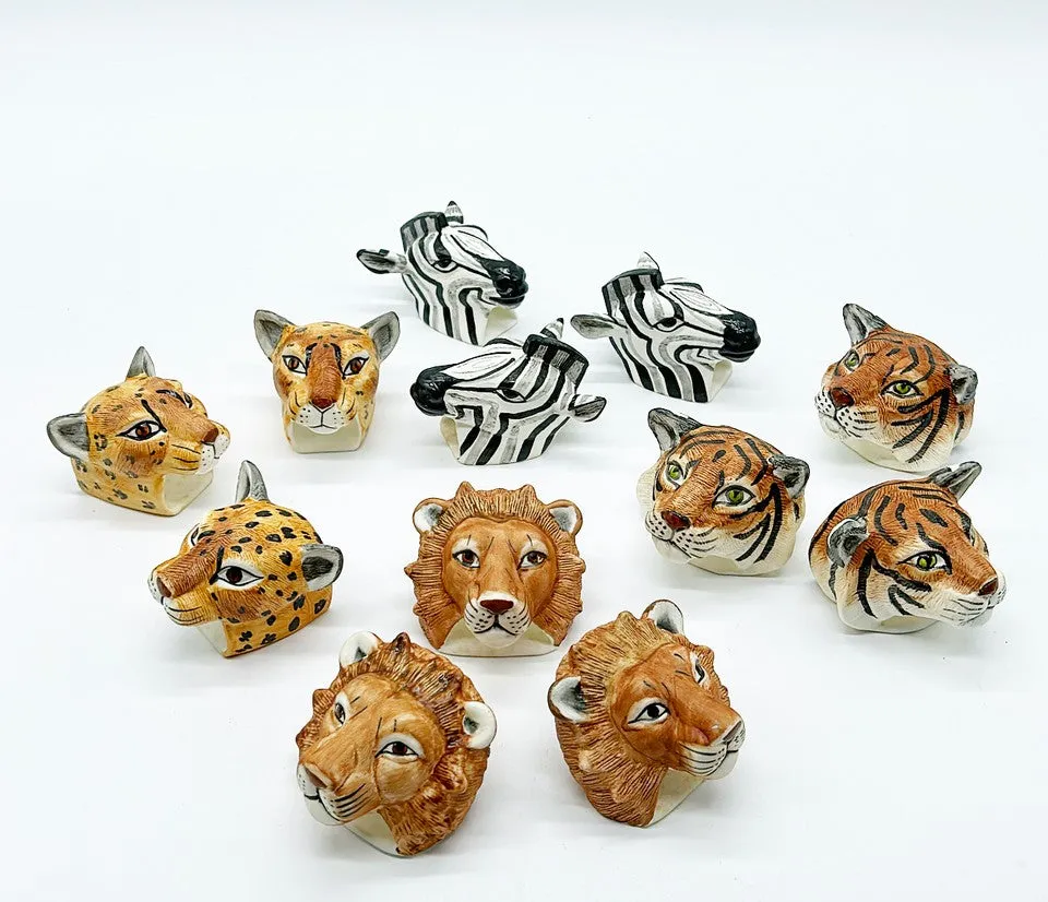 Fun set of 12 vintage late 80s safari style animal head napkin rings.